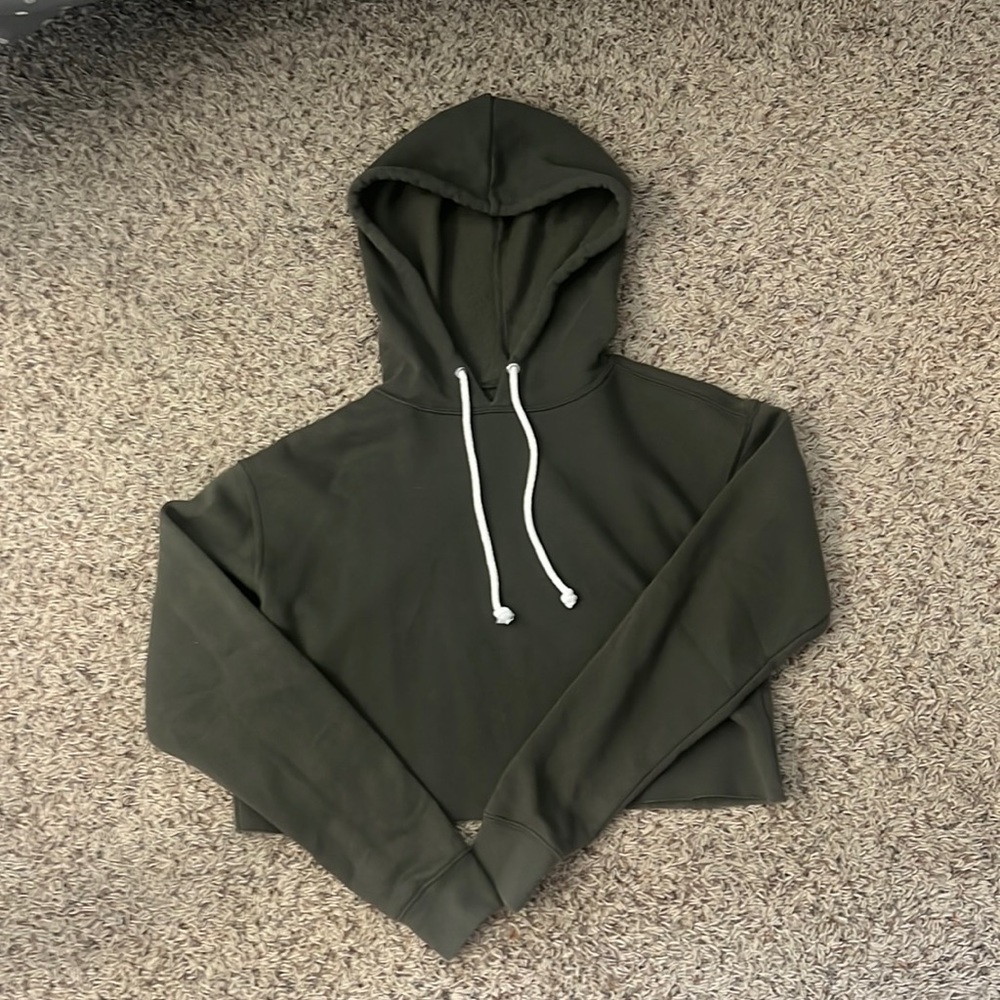 Dark green cropped sweatshirt. Lightly worn
